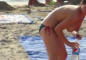 Women showing their hot bodies on a nudist beach