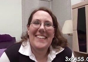 Cheery fat lady in glasses taking care of business