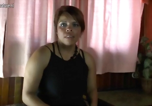 Asian chick in a dark dress shows off her wet pussy