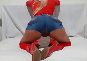 A spicy model with nice round bottom is showing off her nice curves